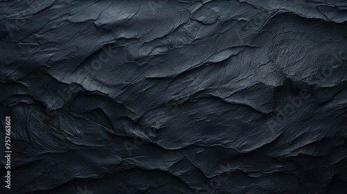 A smooth black paper texture, free of any additional elements or negative attributes. © Muhammad