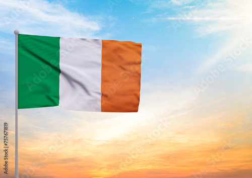 Fotografie 3D illustration of a Ireland flag extended on a flagpole and in the background a