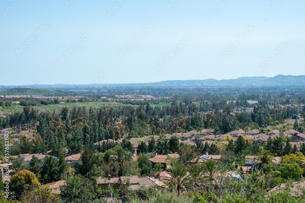 landscape with trees, homes and mountains, southern California