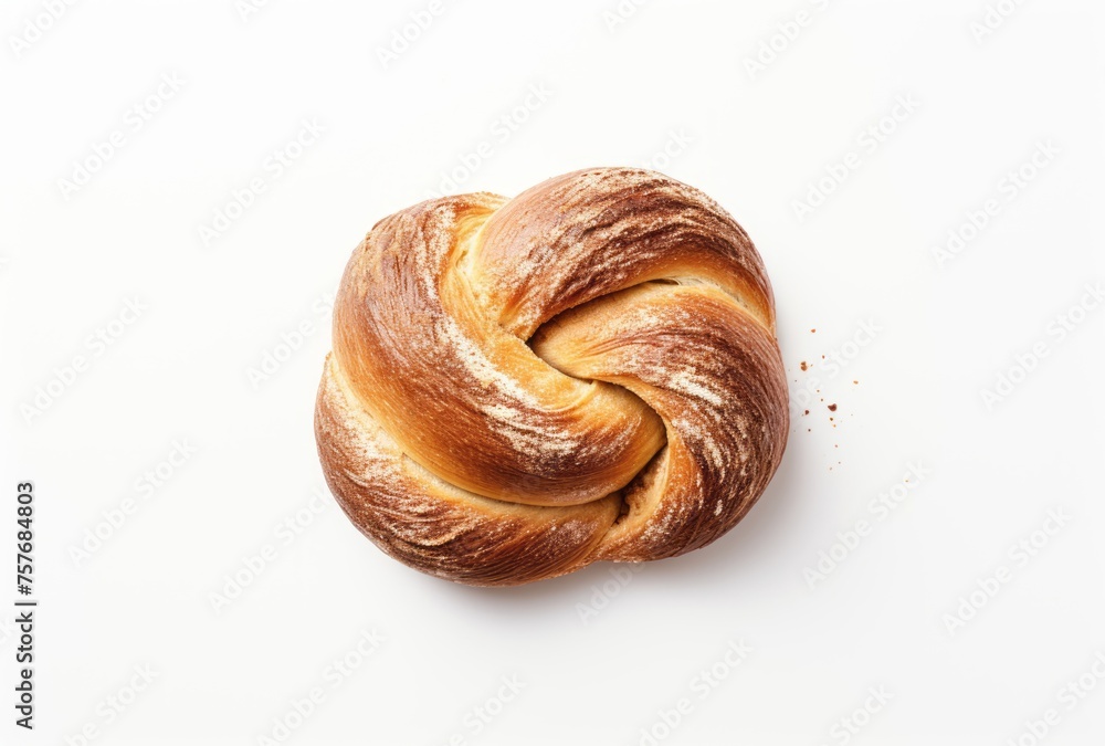 A bun with seeds sits on a white background, its arched doorways, swirling vortexes, and warm tonal range apparent. A bun with seeds sits on a white background, its arched doorways, swirling vortexes, and warm tonal range apparent.