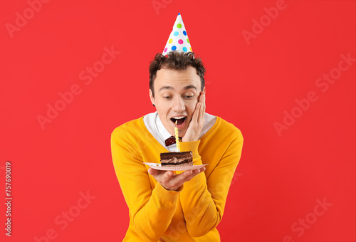 Surprised young man with bi...