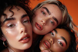 A group of diverse women with different skin tones and hair colors, posing together for a beauty magazine shot with a close up portrait against an orange background