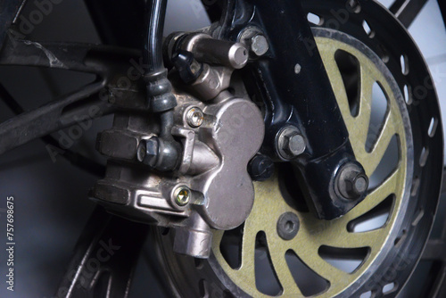 close up of motorcycle disc brakes © Indra