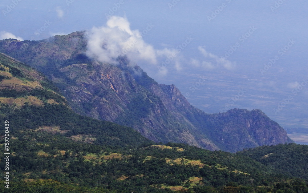 panoramic view of lush green palani mountain range from kodaikanal hill station in tamilnadu, south india