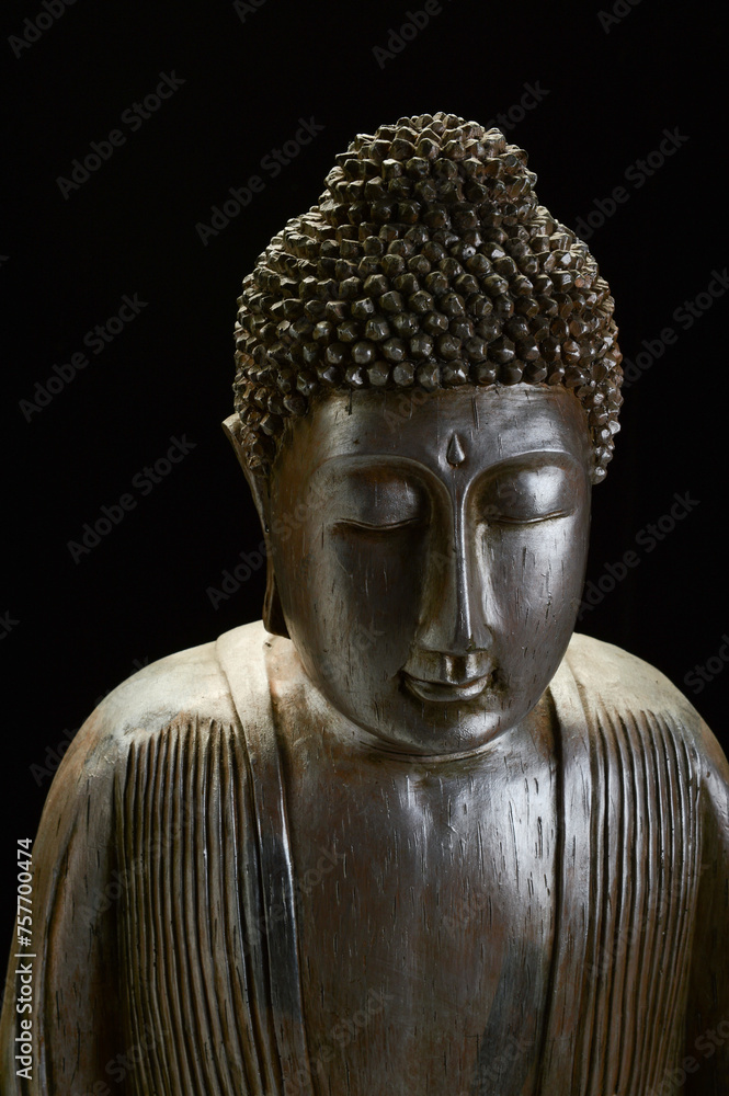 Buddha Statue Head Isolated on Black