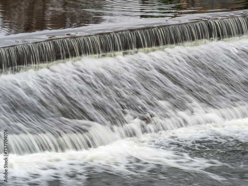 A small flat cascade in a calm river