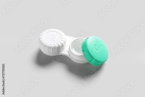 Container for contact lenses on white background