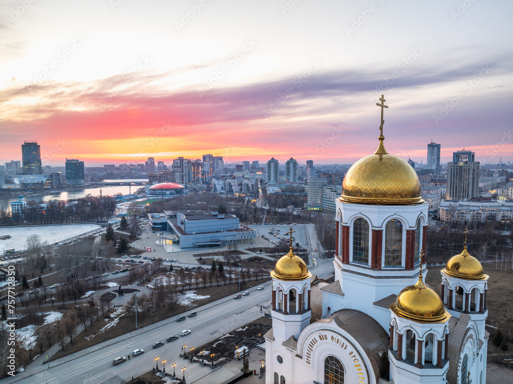 Early spring or autumn Yekaterinburg and Temple on Blood in clear sunset. Aerial view of Yekaterinburg, Russia. Translation of the text on the temple: Honest to the Lord is the death of His saints.