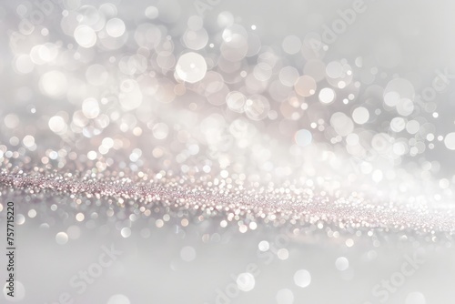 A silver background is blurred in this photo, creating a soft and abstract visual effect