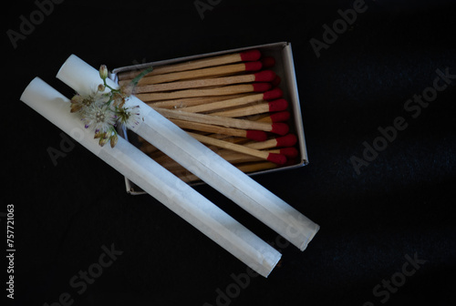 Cigarettes and match on black ceramic background.World No Tobacco Day concept.