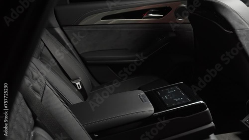 Salon of a premium car. Interior details. Camera moves slowly