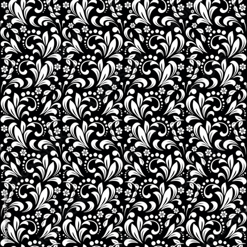 Wallpaper in the style of Baroque. Seamless vector background. White and black floral ornament. Graphic pattern for fabric, wallpaper, packaging. Ornate Damask flower ornament.