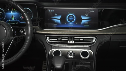 Salon of a premium car. Interior details. Camera moves slowly