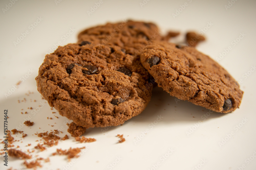 sweet and crunchy chocolate biscuits on a white background sweet and crunchy chocolate biscuits on a white background