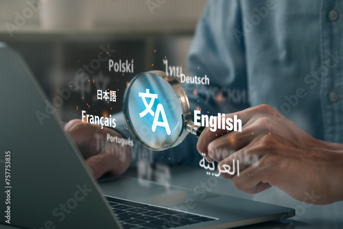 Man hand using magnifying glass to translation of foreign languages on website.Symbol of translation.Ai translator.Worldwide language conversation.