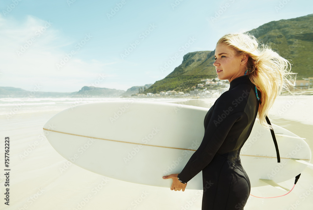 Fototapeta premium Girl, surfer and holding surfboard in beach, Cape Town and training for surfing sports in nature. Athlete, outdoor and adventure in sea, free and swimsuit for waves in summer, water and natural