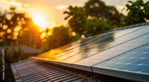 A modern house with a roof covered in solar panels bathed in sunlight, representing a step towards green energy