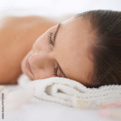 Sleep, massage and face of woman at spa for health, wellness and balance with luxury holistic treatment. Self care, peace and girl for body therapy, comfort and calm pamper service to relax at hotel