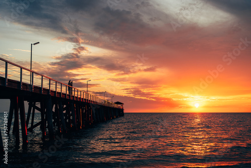 Dynamic sunset over Grange jetty, Adelaide, South Australia.