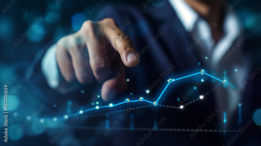 Businessman finger pointing at stock market chart or financial diagram Businessman finger pointing at stock market chart or financial diagram
