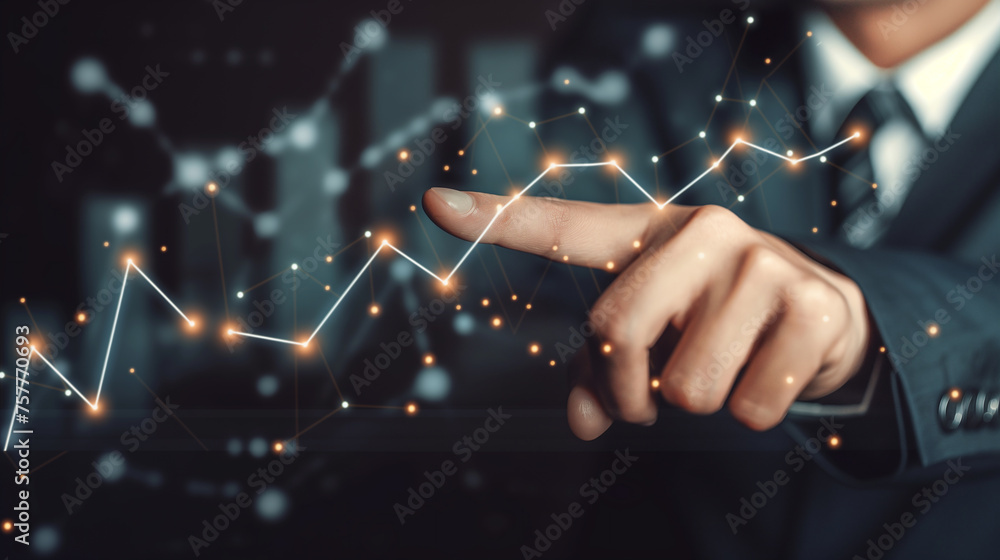 Businessman finger pointing at stock market chart or financial diagram ...