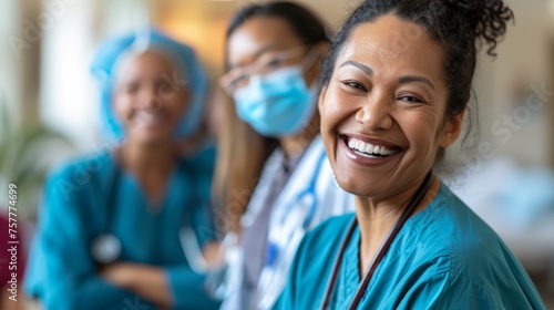 Radiant healthcare professional with a group of diverse medical staff in the background. Professional healthcare photography emphasizing teamwork and patient care.