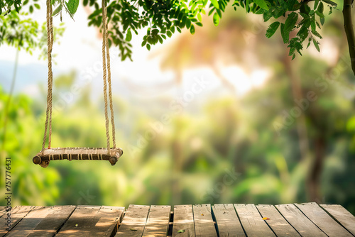 Wooden table top and swing with blurred of nature with bokeh background use for products or something display.  photo