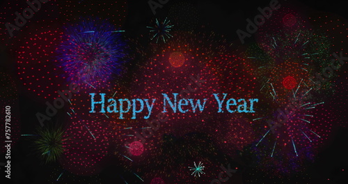 Image of happy new year text over fireworks on black backrgound
