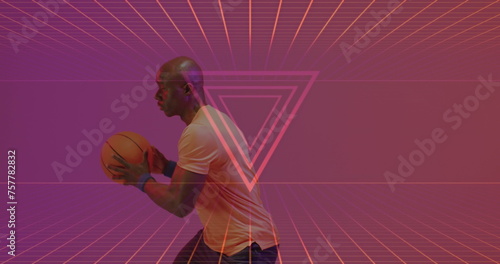 Image of neon pattern over african american basketball player © vectorfusionart