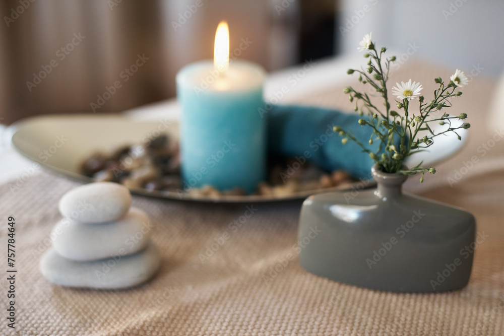 Spa, aromatherapy and candles with plants, rocks for zen, calm and peace to relax for health or natural healing. Incense, wellness or stones for wellbeing, holistic massage or hospitality background