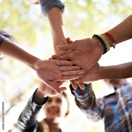 Canvastavla Hands, friends and people for teamwork, collaboration and community outdoor in nature, environment and park from below view