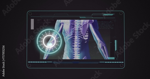 Image of scope scanning and human body spinning on screen