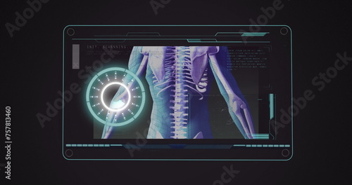 Image of scope scanning and human body spinning on screen