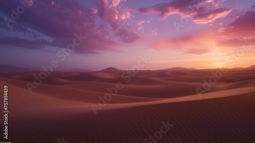 Sunset over sand dunes in the desert