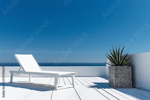 sun lounger on the roof terrace. blue sky, white terrace. generative ai © Alexander Odessa 