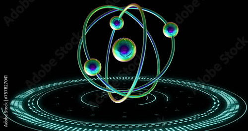 Image of atom model spinning and data processing on black background