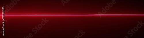 Red Laser Beam on Black. A striking red light flare streaks across a dark expanse, illustrating motion, energy, and high-speed technology. photo