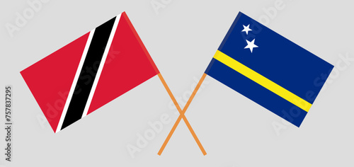 Crossed flags of Trinidad and Tobago and Country of Curacao. Official colors. Correct proportion