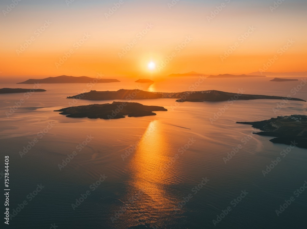 The sun is setting over the ocean, casting a warm glow on the water. The sky is a mix of orange and pink hues, creating a serene and peaceful atmosphere. The water is calm