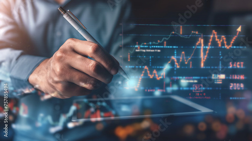 Businessman drawing, writing and planning stock market, financial candle light chart