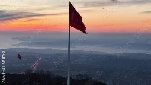 Turkish Flag (Turk Bayragi) in the Sunset Time Drone Video, Camlica Hill Uskudar, Istanbul Turkiye (Turkey) photo