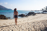 woman on a tropical beach in Thailand