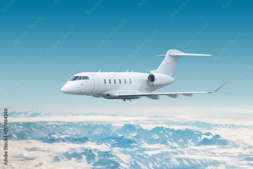 White modern luxury executive aircraft fly over snow covered mountains White modern luxury executive aircraft fly over snow covered mountains