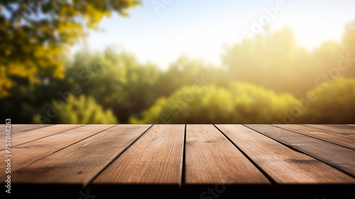 Wooden table on blurred nature background.