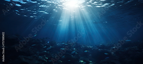 Dark blue ocean surface seen from underwater. sun light rays under water ©  Mohammad Xte