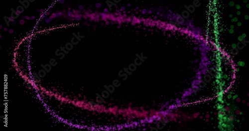 Image of colourful light trails and spots on black background