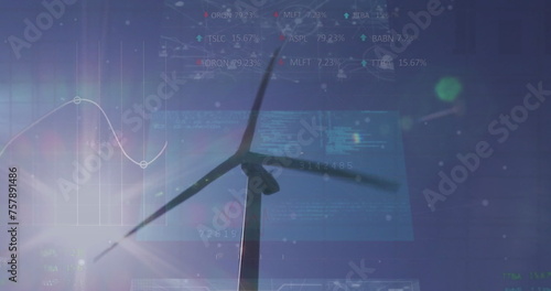 Image of statistics and data processing over wind turbine and engineer on blue background