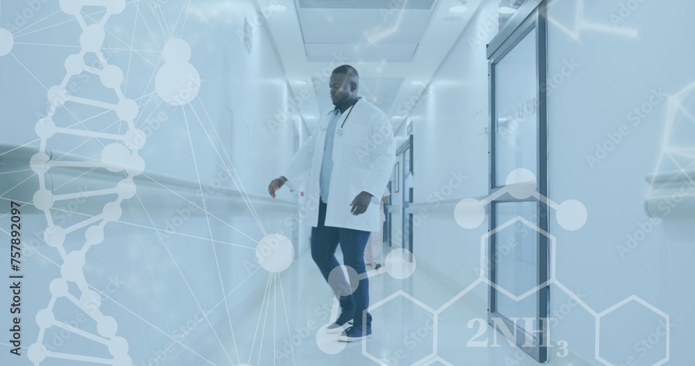 Image of dna strand and medical data processing over african american male doctor Image of dna strand and medical data processing over african american male doctor