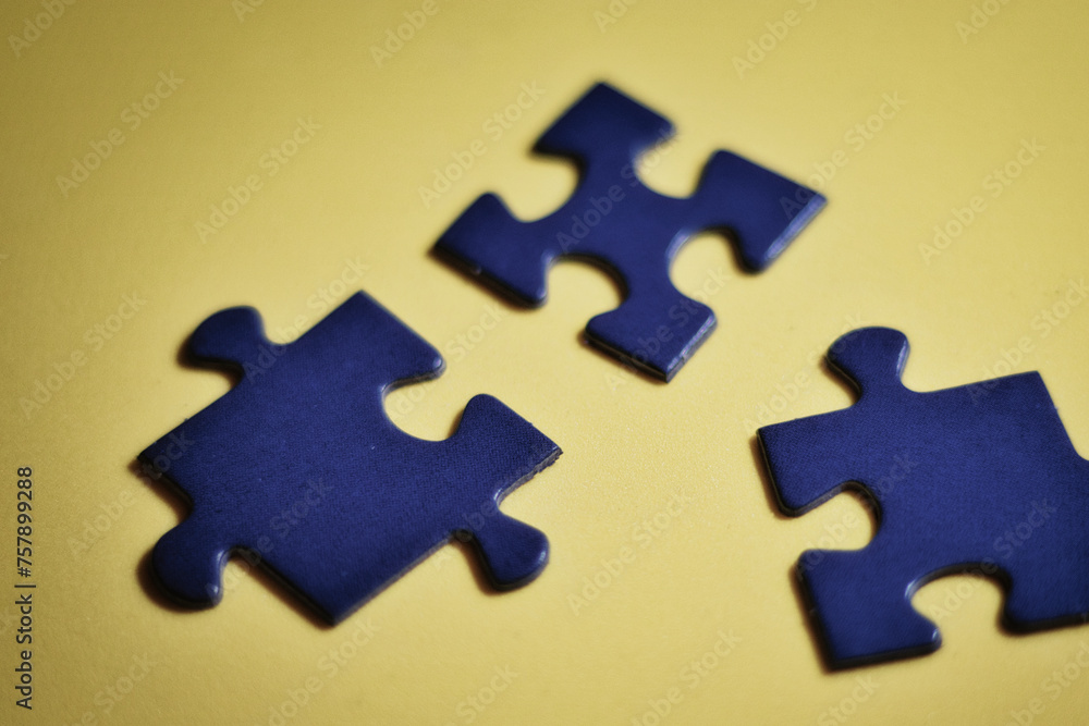 Fototapeta premium Jigsaw Puzzle Pieces - Business - Strategy - Concept - Yellow - Blue - Background 
