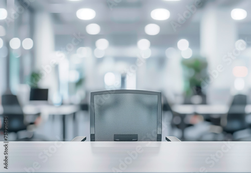 Empty office chair in a modern workspace, corporate environment.